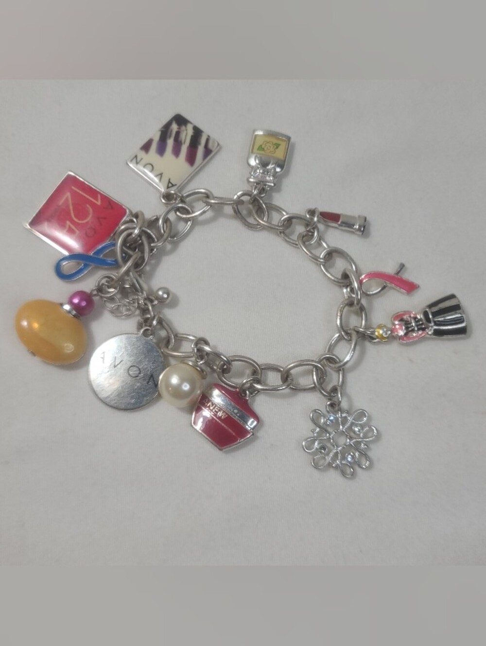 Avon Silver-Tone Charm Bracelet with Pink, Yellow and Blue Accents